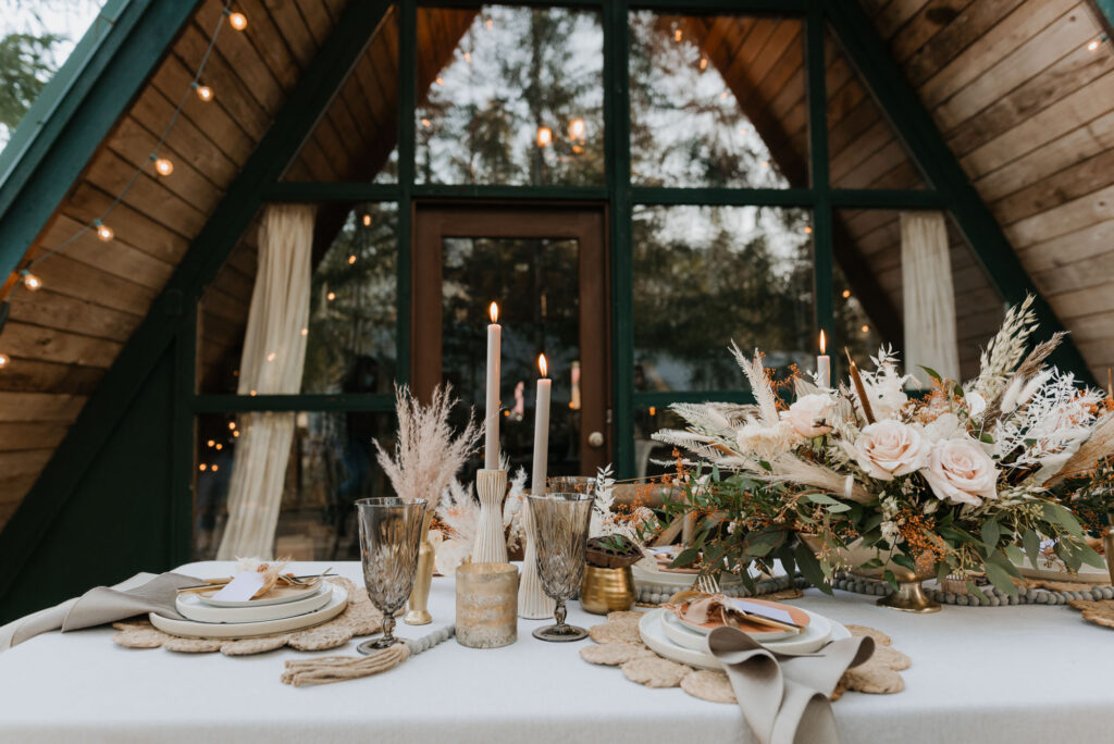 A table arrangement in front of a cabin for a Washington elopement